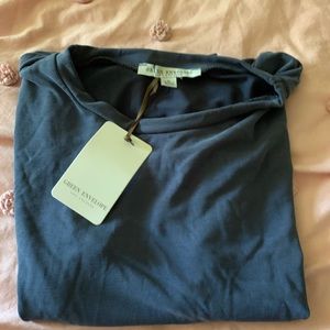 Super cute tee, with tie knot at the bottom